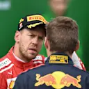 Sebastian Vettel (GER) Ferrari and Max Verstappen (NED) Red Bull Racing in parc ferme at Formula One World Championship, Rd7, Canadian Grand Prix, Race, Montreal, Canada, Sunday10 June 2018. © Simon Galloway/Sutton Images