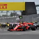 Sebastian Vettel (GER) leads Valtteri Bottas (FIN) Mercedes-AMG F1 W09 EQ Power+ at the start of the race at Formula One World Championship, Rd7, Canadian Grand Prix, Race, Montreal, Canada, Sunday10 June 2018. © Mark Sutton/Sutton Images