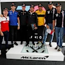 Fernando Alonso (ESP) McLaren celebrates his 300th GP with Marcus Ericsson (SWE) Alfa Romeo Sauber F1 Team, Charles Leclerc (MON) Alfa Romeo Sauber F1 Team, Stoffel Vandoorne (BEL) McLaren, Carlos Sainz jr (ESP) Renault Sport F1 Team, Esteban Ocon (FRA) Force India F1, Sergio Perez (MEX) Force India and Brendon Hartley (NZL) Scuderia Toro Rosso at Formula One World Championship, Rd7, Canadian Grand Prix, Preparations, Montreal, Canada, Thursday 7 June 2018. © Steven Tee/LAT/Sutton Images