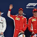 (L to R): Valtteri Bottas (FIN) Mercedes-AMG F1, pole sitter Sebastian Vettel (GER) Ferrari and Kimi Raikkonen (FIN) Ferrari celebrate in parc ferme at Formula One World Championship, Rd3, Chinese Grand Prix, Qualifying, Shanghai, China, Saturday 14 April