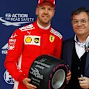 Pole sitter Sebastian Vettel (GER) Ferrari with the Pirelli Pole Position Award in parc ferme at Formula One World Championship, Rd3, Chinese Grand Prix, Qualifying, Shanghai, China, Saturday 14 April 2018. © Glenn Dunbar/LAT/Sutton Images