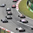 Sebastian Vettel (GER) Ferrari SF-71H and Kimi Raikkonen (FIN) Ferrari SF-71H lead at the start of the race at Formula One World Championship, Rd3, Chinese Grand Prix, Race, Shanghai, China, Sunday 15 April 2018. © Jerry Andre/Sutton Images