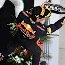 Daniel Ricciardo (AUS) Red Bull Racing and Valtteri Bottas (FIN) Mercedes-AMG F1 celebrate on the podium with the champagne at Formula One World Championship, Rd3, Chinese Grand Prix, Race, Shanghai, China, Sunday 15 April 2018. © Mark Sutton/Sutton Image