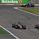 Romain Grosjean (FRA) Haas VF-18 and Fernando Alonso (ESP) McLaren MCL33 battle at Formula One World Championship, Rd3, Chinese Grand Prix, Race, Shanghai, China, Sunday 15 April 2018. © Mark Sutton/Sutton Images