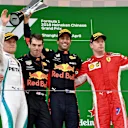 Valtteri Bottas (FIN), Daniel Ricciardo (AUS) and Kimi Raikkonen (FIN) celebrate on the podium at Formula One World Championship, Rd3, Chinese Grand Prix, Race, Shanghai, China, Sunday 15 April 2018. © Jerry Andre/Sutton Images