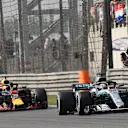 Kimi Raikkonen (FIN) Ferrari SF-71H and Valtteri Bottas (FIN) Mercedes-AMG F1 W09 EQ Power+ battle at Formula One World Championship, Rd3, Chinese Grand Prix, Race, Shanghai, China, Sunday 15 April 2018. © Jerry Andre/Sutton Images