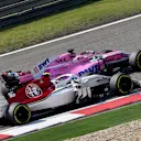 Charles Leclerc (MON) Alfa Romeo Sauber C37 and Sergio Perez (MEX) Force India VJM11 at Formula One World Championship, Rd3, Chinese Grand Prix, Race, Shanghai, China, Sunday 15 April 2018. © Jerry Andre/Sutton Images