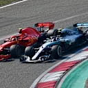 Kimi Raikkonen (FIN) Ferrari SF-71H and Valtteri Bottas (FIN) Mercedes-AMG F1 W09 EQ Power+ battle at Formula One World Championship, Rd3, Chinese Grand Prix, Race, Shanghai, China, Sunday 15 April 2018. © Jerry Andre/Sutton Images