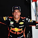 Race winner Daniel Ricciardo (AUS) Red Bull Racing celebrates on the podium with the trophy at Formula One World Championship, Rd3, Chinese Grand Prix, Race, Shanghai, China, Sunday 15 April 2018. © Mark Sutton/Sutton Images