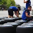 Scuderia Toro Rosso mechanics and Pirelli tyres at Formula One World Championship, Rd3, Chinese Grand Prix, Preparations, Shanghai, China, Thursday 12 April 2018. © Mark Sutton/Sutton Images