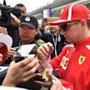 Kimi Raikkonen (FIN) Ferrari signs autographs for the fans at Formula One World Championship, Rd3, Chinese Grand Prix, Preparations, Shanghai, China, Thursday 12 April 2018. © Mark Sutton/Sutton Images