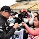 Valtteri Bottas (FIN) Mercedes-AMG F1 signs autographs for the fans at Formula One World Championship, Rd3, Chinese Grand Prix, Preparations, Shanghai, China, Thursday 12 April 2018. © Simon Galloway/Sutton Images