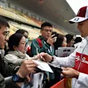 Marcus Ericsson (SWE) Alfa Romeo Sauber F1 Team signs autographs for the fans at Formula One World Championship, Rd3, Chinese Grand Prix, Preparations, Shanghai, China, Thursday 12 April 2018. © Simon Galloway/Sutton Images