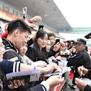Carlos Sainz jr (ESP) Renault Sport F1 Team signs autographs for the fans at Formula One World Championship, Rd3, Chinese Grand Prix, Preparations, Shanghai, China, Thursday 12 April 2018. © Simon Galloway/Sutton Images