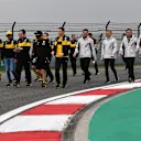 Carlos Sainz jr (ESP) Renault Sport F1 Team and Kevin Magnussen (DEN) Haas F1 walk the track at Formula One World Championship, Rd3, Chinese Grand Prix, Preparations, Shanghai, China, Thursday 12 April 2018. © Mark Sutton/Sutton Images