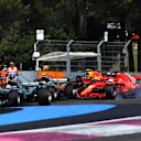 Lewis Hamilton (GBR) Mercedes-AMG F1 W09 EQ Power+ leads at the start of the race as Sebastian Vettel (GER) Ferrari SF-71H locks up and hits Valtteri Bottas (FIN) Mercedes-AMG F1 W09 EQ Power+ at Formula One World Championship, Rd8, French Grand Prix, Race, Paul Ricard, France, Sunday 24 June 2018. © Mark Sutton/Sutton Images