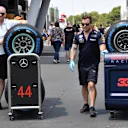 Red Bull Racing and Mercedes AMG F1 mechanics with Pirelli tyres at Formula One World Championship, Rd8, French Grand Prix, Preparations, Paul Ricard, France, Thursday 21 June 2018. © Mark Sutton/Sutton Images