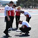 Charles Leclerc (MON) Alfa Romeo Sauber F1 Team walks the track with Xevi Pujolar (ESP) Alfa Romeo Sauber F1 Team Head of Track Engineering and Ruth Buscombe (GBR) Alfa Romeo Sauber F1 Team Race Strategist at Formula One World Championship, Rd8, French Grand Prix, Preparations, Paul Ricard, France, Thursday 21 June 2018. © Mark Sutton/Sutton Images