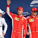 (L to R): Valtteri Bottas (FIN) Mercedes-AMG F1, pole sitter Sebastian Vettel (GER) Ferrari and Kimi Raikkonen (FIN) Ferrari celebrate in parc ferme at Formula One World Championship, Rd11, German Grand Prix, Qualifying, Hockenheim, Germany, Saturday 21 July 2018. © Mark Sutton/Sutton Images