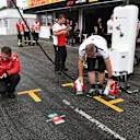Alfa Romeo Sauber F1 Team mechanics dry the pit box at Formula One World Championship, Rd11, German Grand Prix, Qualifying, Hockenheim, Germany, Saturday 21 July 2018. © Mark Sutton/Sutton Images