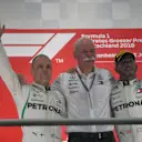 Valtteri Bottas (FIN) Mercedes-AMG F1, Dr. Dieter Zetsche (GER), CEO of Daimler AG and Lewis Hamilton (GBR) Mercedes-AMG F1 celebrate on the podium at Formula One World Championship, Rd11, German Grand Prix, Race, Hockenheim, Germany, Sunday 22 July 2018. © Mark Sutton/Sutton Images