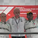(L to R): Valtteri Bottas (FIN) Mercedes-AMG F1, Dr. Dieter Zetsche (GER), CEO of Daimler AG and Lewis Hamilton (GBR) Mercedes-AMG F1 celebrate on the podium at Formula One World Championship, Rd11, German Grand Prix, Race, Hockenheim, Germany, Sunday 22 July 2018. © Mark Sutton/Sutton Images