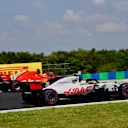 Kevin Magnussen (DEN) Haas VF-18 and Sebastian Vettel (GER) Ferrari SF-71H at Formula One World Championship, Rd12, Hungarian Grand Prix, Practice, Hungaroring, Hungary, Friday 27 July 2018. © Jerry Andre/Sutton Images