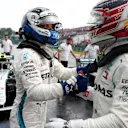 Pole sitter Lewis Hamilton (GBR) Mercedes-AMG F1 and Valtteri Bottas (FIN) Mercedes-AMG F1 celebrate in parc ferme at Formula One World Championship, Rd12, Hungarian Grand Prix, Qualifying, Hungaroring, Hungary, Saturday 28 July 2018. © Steven Tee/LAT/Sutton Images