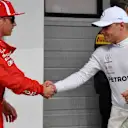 Kimi Raikkonen (FIN) Ferrari and Valtteri Bottas (FIN) Mercedes-AMG F1 celebrate in parc ferme at Formula One World Championship, Rd12, Hungarian Grand Prix, Qualifying, Hungaroring, Hungary, Saturday 28 July 2018. © Mark Sutton/Sutton Images