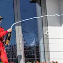 Kimi Raikkonen (FIN) Ferrari celebrates on the podium with the champagne at Formula One World Championship, Rd12, Hungarian Grand Prix, Race, Hungaroring, Hungary, Sunday 29 July 2018. © Manuel Goria/Sutton Images