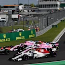 Marcus Ericsson (SWE) Alfa Romeo Sauber C37 and Esteban Ocon (FRA) Force India VJM11 at the start of the race at Formula One World Championship, Rd12, Hungarian Grand Prix, Race, Hungaroring, Hungary, Sunday 29 July 2018. © Jerry Andre/Sutton Images