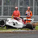 Marshals and the crashed car of Marcus Ericsson, Alfa Romeo Sauber C37 in FP2 at Formula One World Championship, Rd14, Italian Grand Prix, Practice, Monza, Italy, Friday 31 August 2018. © Mark Sutton/Sutton Images