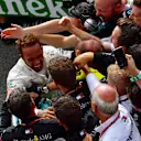 Lewis Hamilton, Mercedes AMG F1 celebrates with his mechanics in parc ferme at Formula One World Championship, Rd14, Italian Grand Prix, Race, Monza, Italy, Sunday 2 September 2018. © Jerry Andre/Sutton Images