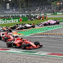 Kimi Raikkonen, Ferrari SF71H, Sebastian Vettel, Ferrari SF71H and Lewis Hamilton, Mercedes AMG F1 W09 at the start of the race at Formula One World Championship, Rd14, Italian Grand Prix, Race, Monza, Italy, Sunday 2 September 2018. © Jerry Andre/Sutton Images