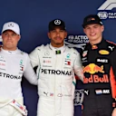 (L to R): Valtteri Bottas, Mercedes AMG F1, Lewis Hamilton, Mercedes AMG F1 and Max Verstappen, Red Bull Racing celebrate in parc ferme at Formula One World Championship, Rd17, Japanese Grand Prix, Qualifying, Suzuka, Japan, Saturday 6 October 2018.