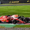 Kimi Raikkonen, Ferrari SF71H and Max Verstappen, Red Bull Racing RB14 battle at Formula One World Championship, Rd17, Japanese Grand Prix, Race, Suzuka, Japan, Sunday 7 October 2018.