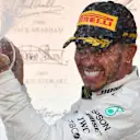 Race winner Lewis Hamilton, Mercedes AMG F1 celebrates on the podium with the champagne at Formula One World Championship, Rd17, Japanese Grand Prix, Race, Suzuka, Japan, Sunday 7 October 2018.