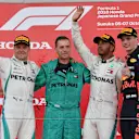 (L to R): Valtteri Bottas, Mercedes AMG F1, Matt Deane, Mercedes AMG F1 Chief Mechanic, Lewis Hamilton, Mercedes AMG F1 and Max Verstappen, Red Bull Racing celebrate on the podium at Formula One World Championship, Rd17, Japanese Grand Prix, Race, Suzuka, Japan, Sunday 7 October 2018.