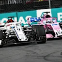 Marcus Ericsson, Alfa Romeo Sauber C37 and Sergio Perez, Racing Point Force India VJM11 battle at Formula One World Championship, Rd19, Mexican Grand Prix, Race, Circuit Hermanos Rodriguez, Mexico City, Mexico, Sunday 28 October 2018.