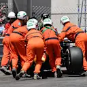 Marshals recover the crashed car of Max Verstappen (NED) Red Bull Racing RB14 in FP3 at Formula One World Championship, Rd6, Monaco Grand Prix, Qualifying, Monte-Carlo, Monaco, Saturday 26 May 2018. © Mark Sutton/Sutton Images