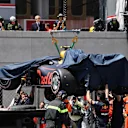 Marshals recover the crashed car of Max Verstappen (NED) Red Bull Racing RB14 in FP3 at Formula One World Championship, Rd6, Monaco Grand Prix, Qualifying, Monte-Carlo, Monaco, Saturday 26 May 2018. © Mark Sutton/Sutton Images