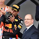 Race winner Daniel Ricciardo (AUS) Red Bull Racing celebrates on the podium with HSH Prince Albert of Monaco (MON) and the trophy at Formula One World Championship, Rd6, Monaco Grand Prix, Race, Monte-Carlo, Monaco, Sunday 27 May 2018. © Mark Sutton/Sutton Images