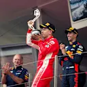 Sebastian Vettel (GER) Ferrari celebrates on the podium with the trophy at Formula One World Championship, Rd6, Monaco Grand Prix, Race, Monte-Carlo, Monaco, Sunday 27 May 2018. © Manuel Goria/Sutton Images