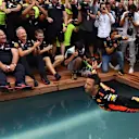 Race winner Daniel Ricciardo (AUS) Red Bull Racing celebrates in the Red Bull Energy Station swimming pool at Formula One World Championship, Rd6, Monaco Grand Prix, Race, Monte-Carlo, Monaco, Sunday 27 May 2018. © Mark Sutton/Sutton Images
