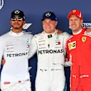 (L to R): Lewis Hamilton, Mercedes AMG F1, Valtteri Bottas, Mercedes AMG F1 and Sebastian Vettel, Ferrari celebrate in parc ferme at Formula One World Championship, Rd16, Russian Grand Prix, Qualifying, Sochi Autodrom, Sochi, Krasnodar Krai, Russia, Saturday 29 September 2018.