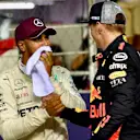 Lewis Hamilton, Mercedes AMG F1 and Max Verstappen, Red Bull Racing celebrate in parc ferme at Formula One World Championship, Rd15, Singapore Grand Prix, Qualifying, Marina Bay Circuit, Singapore, Saturday 15 September 2018.