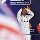 (L to R): Lewis Hamilton, Mercedes AMG F1 and Sebastian Vettel, Ferrari celebrate on the podium at Formula One World Championship, Rd15, Singapore Grand Prix, Race, Marina Bay Circuit, Singapore, Sunday 16 September 2018.