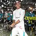 Lewis Hamilton, Mercedes AMG F1 celebrates with the champagne and his team at Formula One World Championship, Rd15, Singapore Grand Prix, Race, Marina Bay Circuit, Singapore, Sunday 16 September 2018.