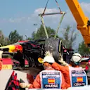 The crashed car of Daniel Ricciardo (AUS) Red Bull Racing RB14 is recovered in FP1 at Formula One World Championship, Rd5, Spanish Grand Prix, Practice, Barcelona, Spain, Friday 11 May 2018. © Rubio/Sutton Images