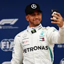 Pole sitter Lewis Hamilton (GBR) Mercedes-AMG F1 celebrates with a selfie in parc ferme at Formula One World Championship, Rd5, Spanish Grand Prix, Qualifying, Barcelona, Spain, Saturday 12 May 2018. © Mark Sutton/Sutton Images